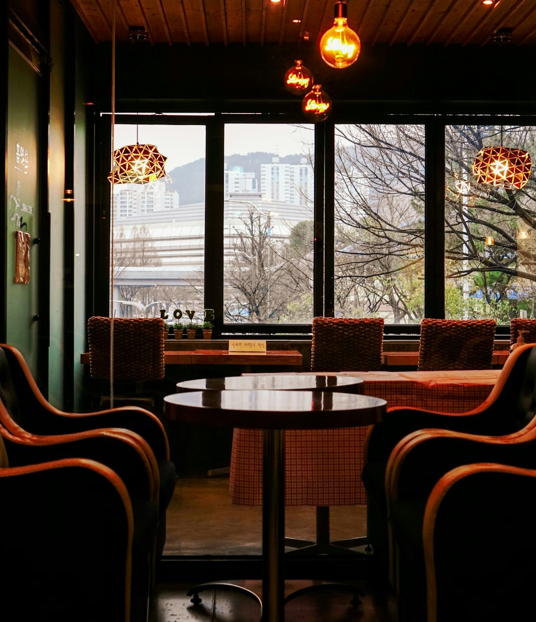 Cozy hygge Danish cafe interior with warm lighting